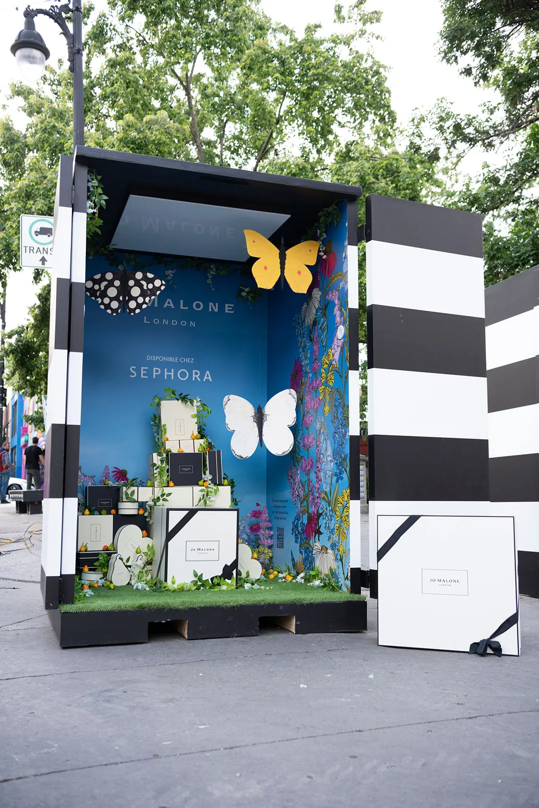 Jo Malone IG Cube activation with butterfly signage and florals