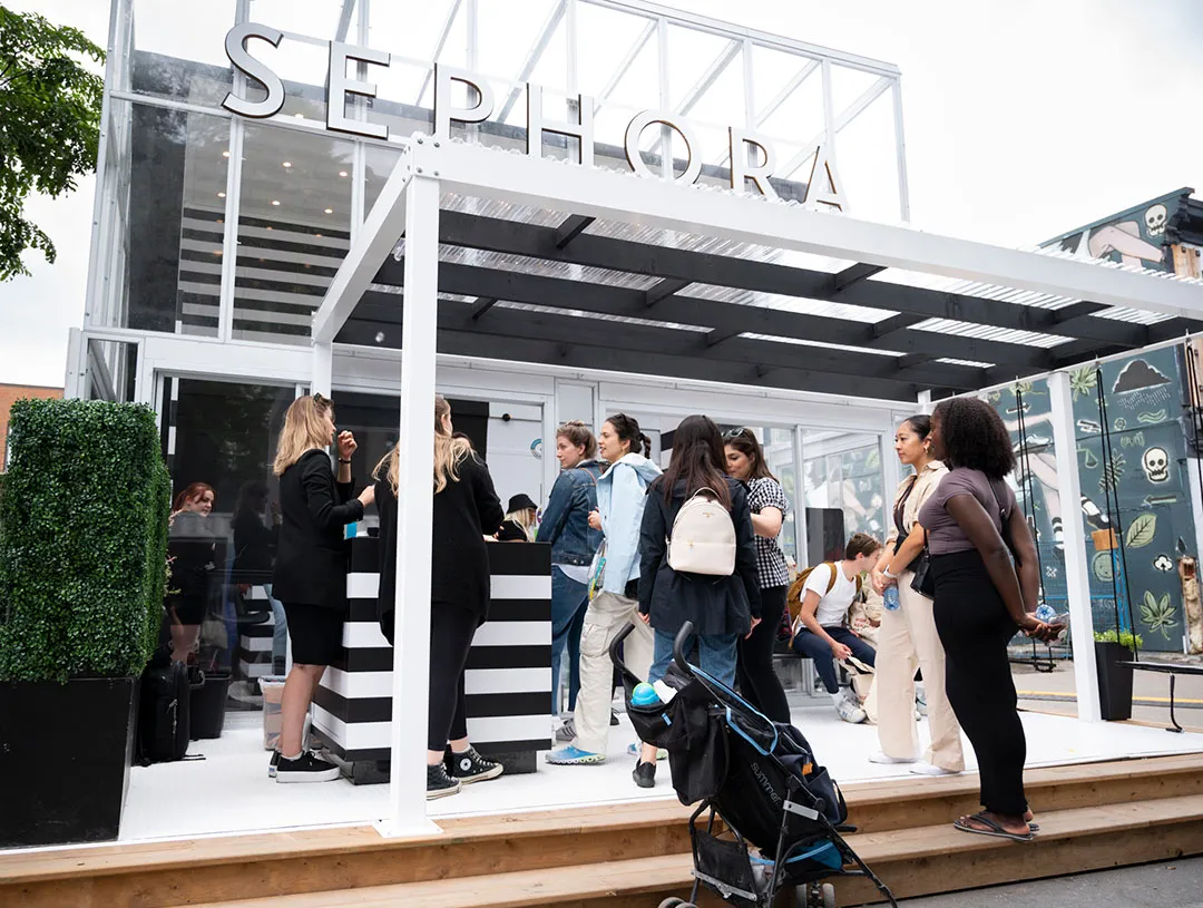 Sephora Artistry House exterior with a crowd under the canopy