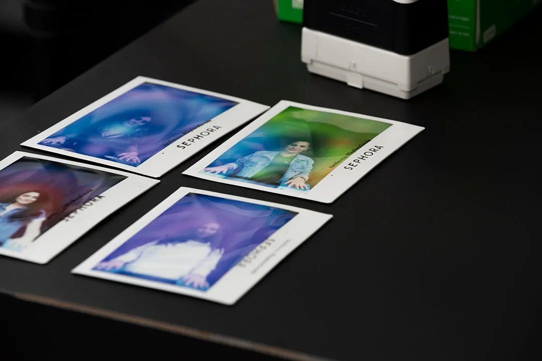 Four aura photography prints on display